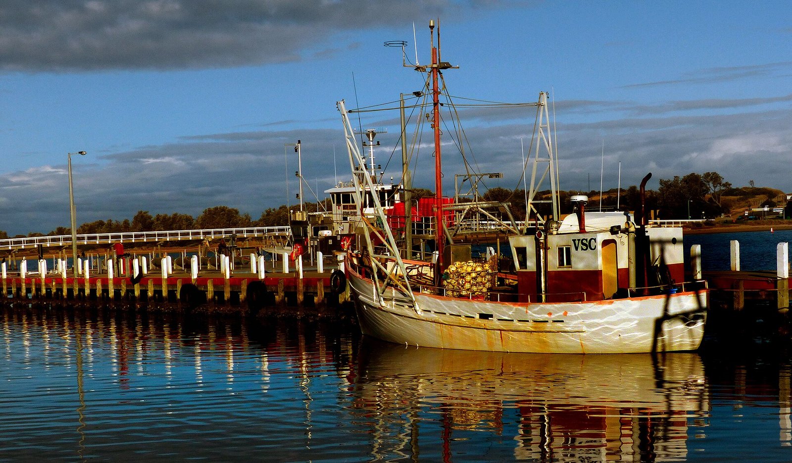 Fishing boats moored at Lakes Entrance in the evening light