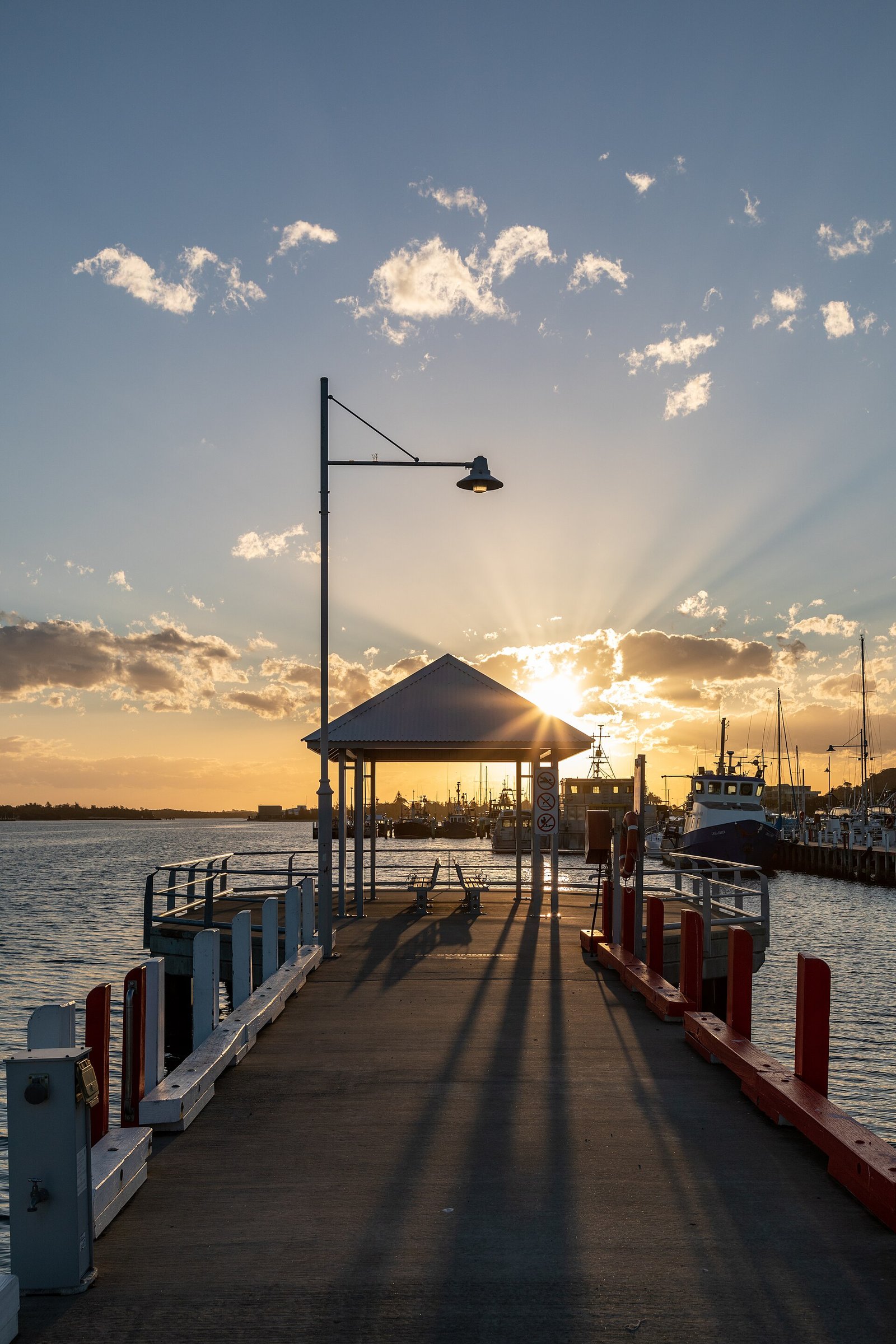 A jetty and gazebo at Cunningham Quay at sunrise